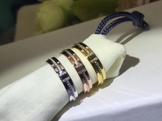 Metal bangles in silver, gold and rose tones